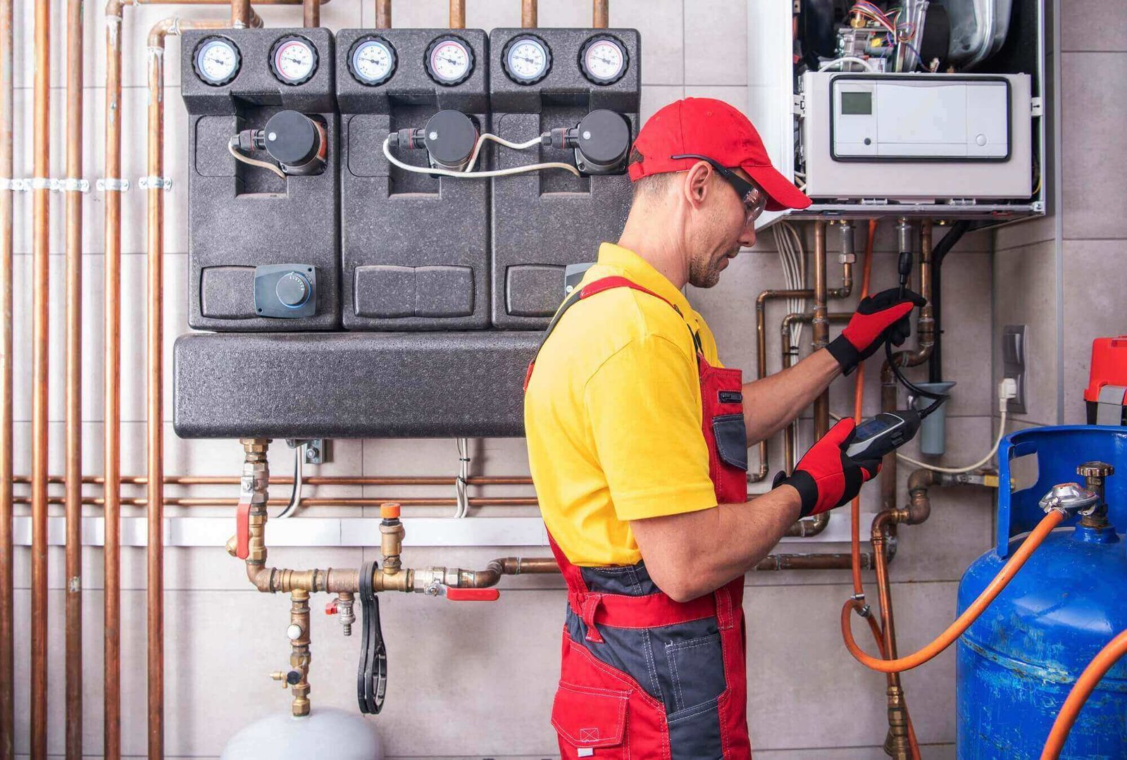 Drain cleaning technician performing regular home system check in Dallas TX