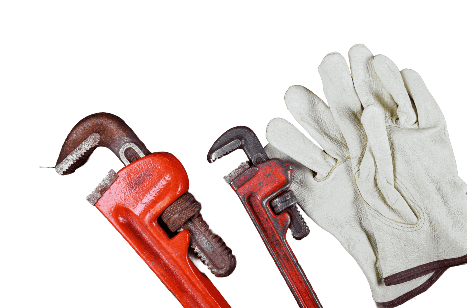 Wrench and safety gloves used for drain cleaning service in Dallas TX